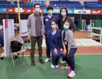 Ian Irwin and fellow volunteers pose at the Armory.
